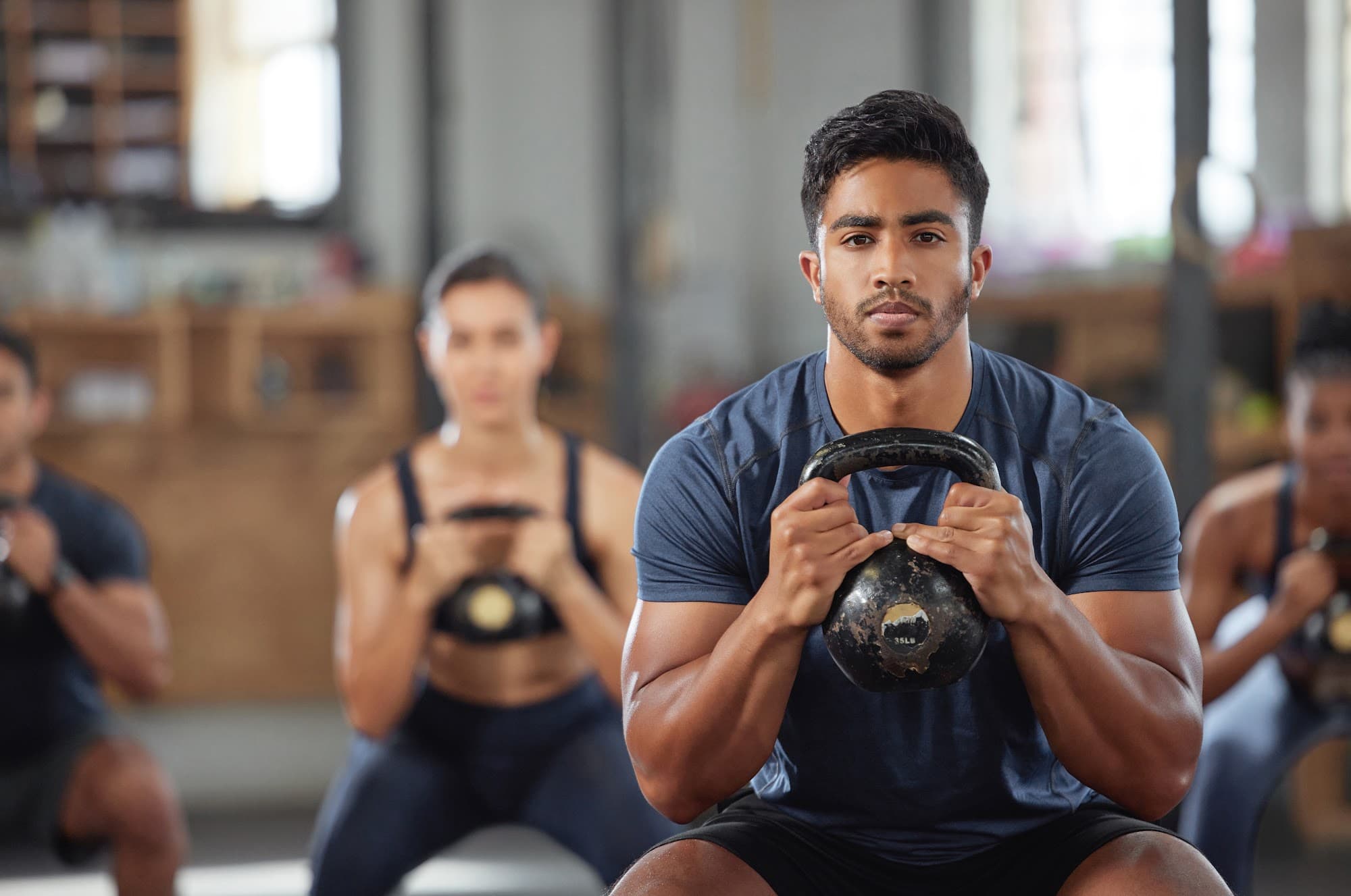 Gym software helps trainers manage clients in a modern studio setting