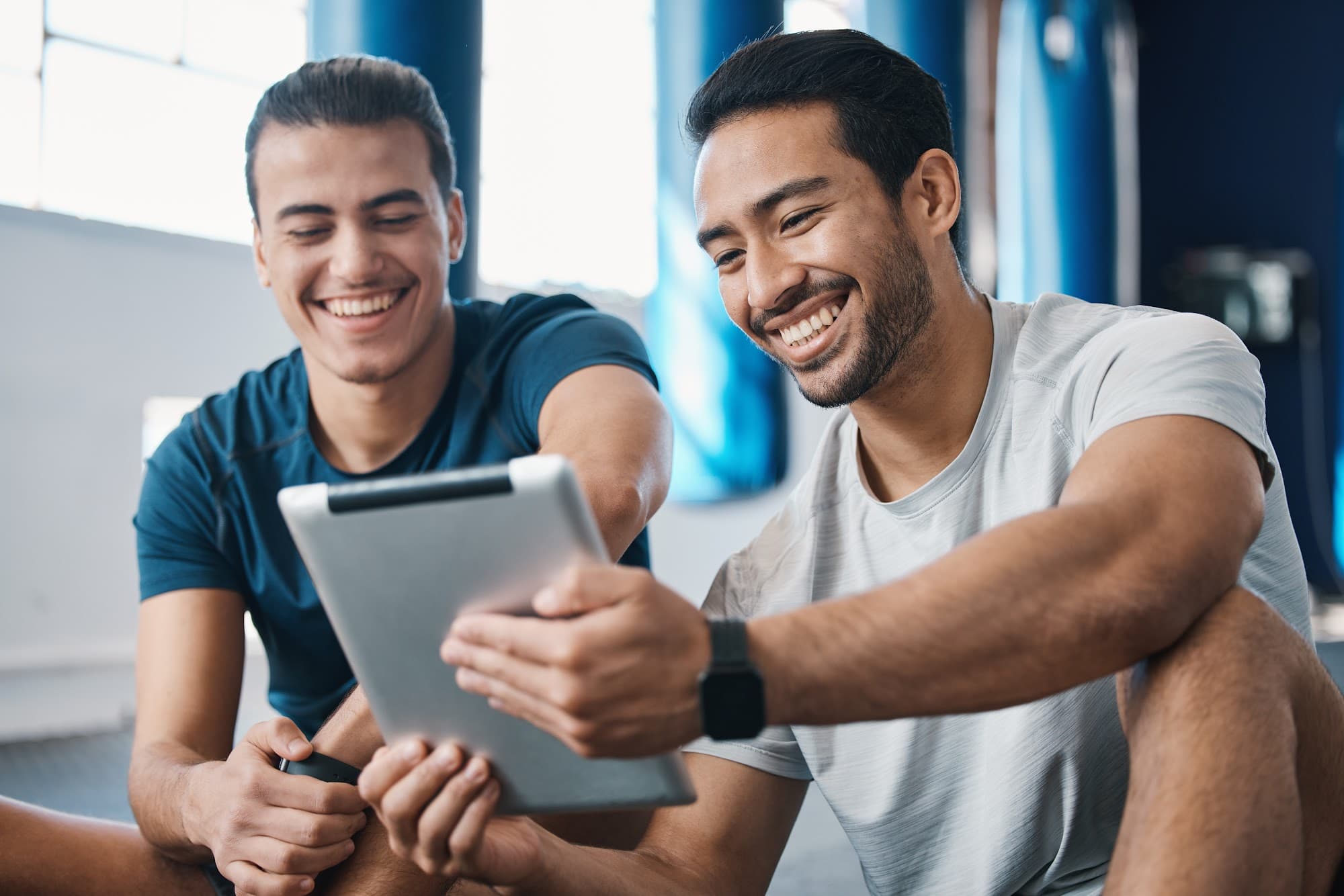 Gym staff using digital tools to engage leads and manage marketing tasks